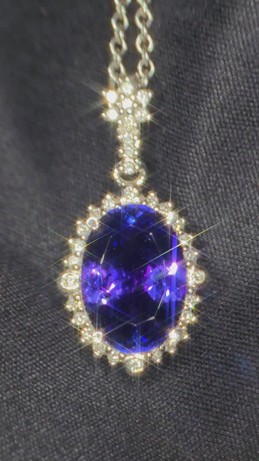 18ct White Gold, 5.3ct, Eye Clean Tanzanite Pendant With 1.2cts VS1-2 Diamonds. WGI certified.