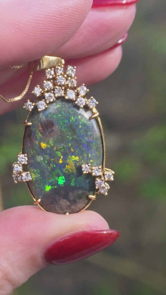 18ct Gold, 18.8ct Boulder Opal & 0.6ct VS2-SI1 Diamond Pendant. Includes WGI report.