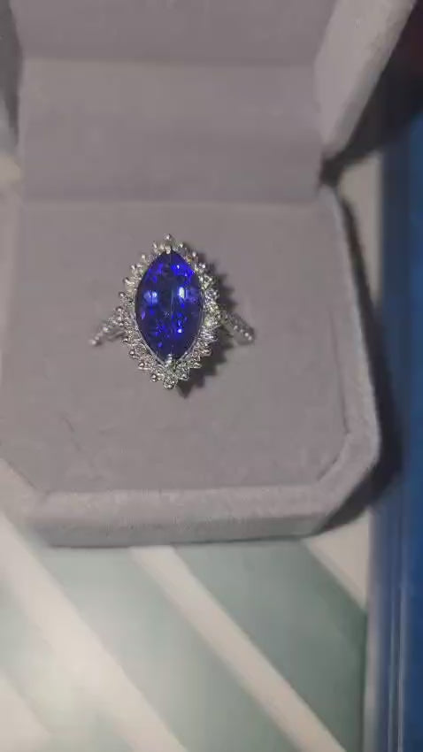 Platinum 2.71ct Tanzanite & VS Marquise Diamond Ring With Gemmological Report