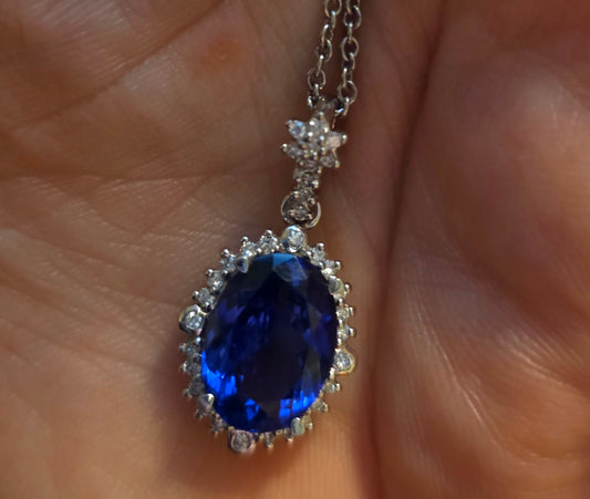 18ct White Gold, 5.3ct, Eye Clean Tanzanite Pendant With 1.2cts VS1-2 Diamonds. WGI certified.