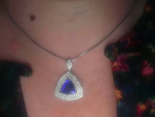 18ct White Gold, 4.3ct Trilliant Tanzanite & 1.05ct VS2-SI1 Diamond Necklace With WGI Report + 6.5ct Tanzanite & 1ct Diamond Ring