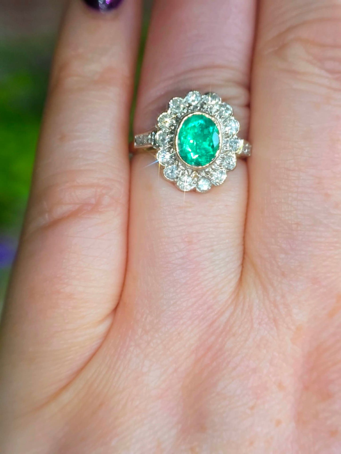 A stunning 1.3ct F1 Columbian emerald & 0.5ct Diamond Flower Ring. Size N. Includes WGI Appraisal & Valuation.